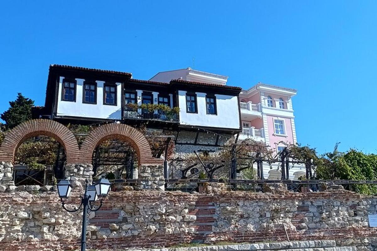 a building on top of a stone wall