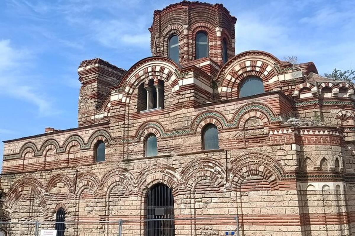 a large brick building with a tower on top