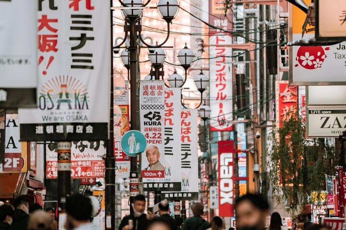 a busy city street filled with lots of signs