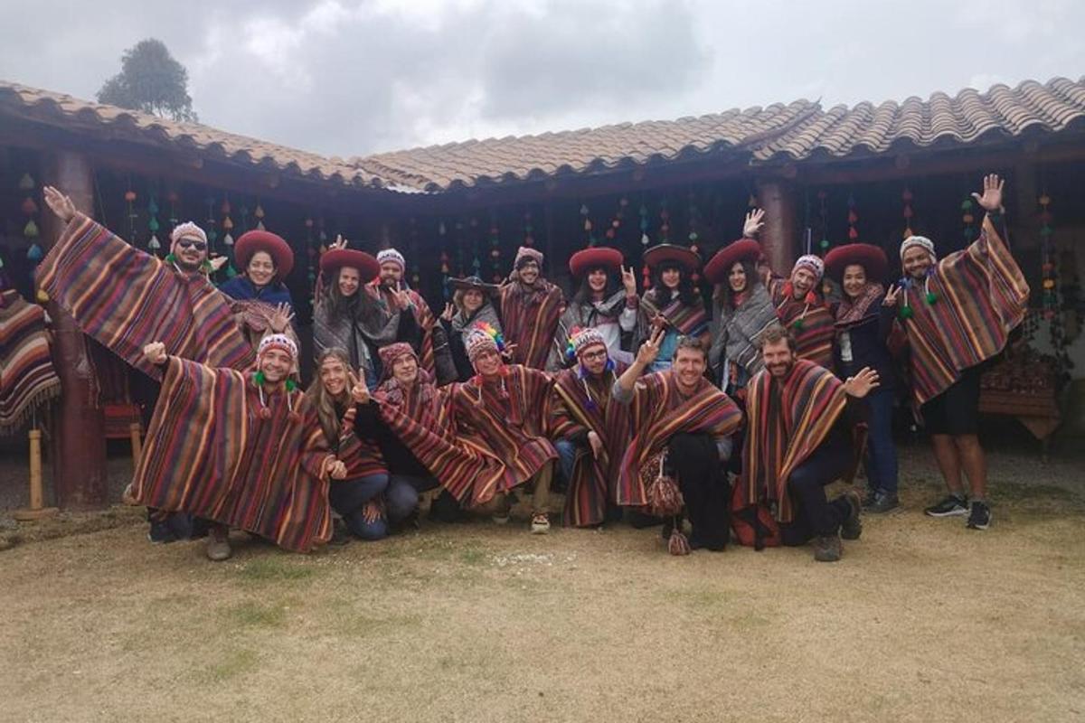 a group of people dressed in costumes posing for a picture