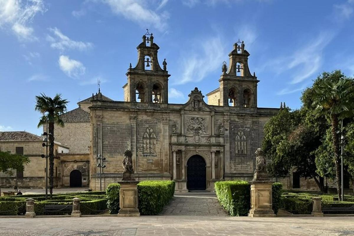 an old building with two towers on top of it