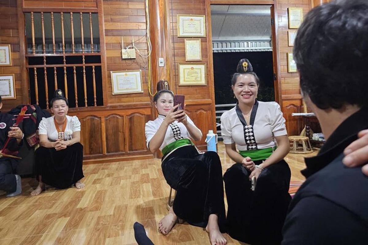 a group of women sitting on the floor in a room