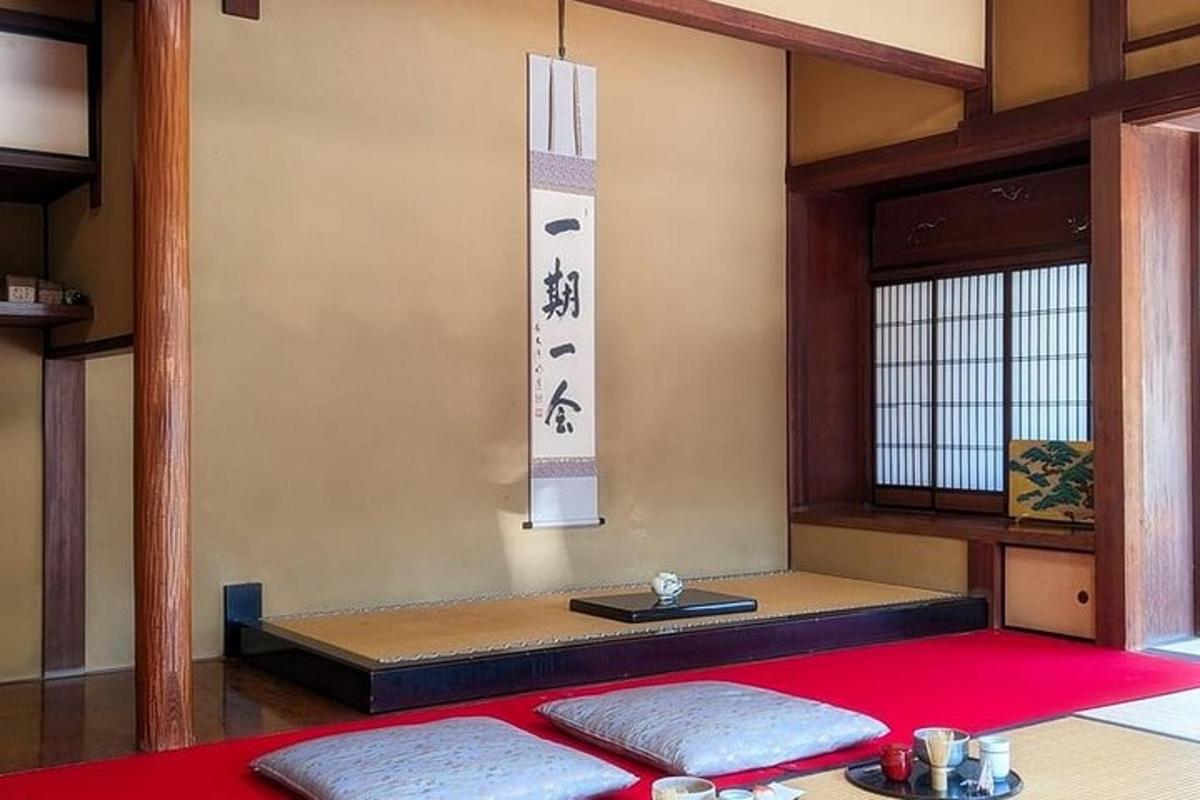 a room with two mats on a red rug