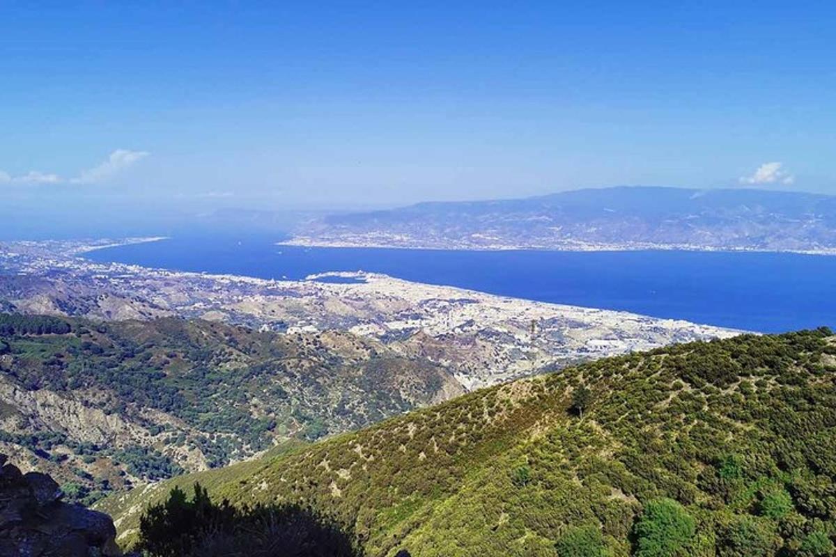 a view of the ocean from a mountain