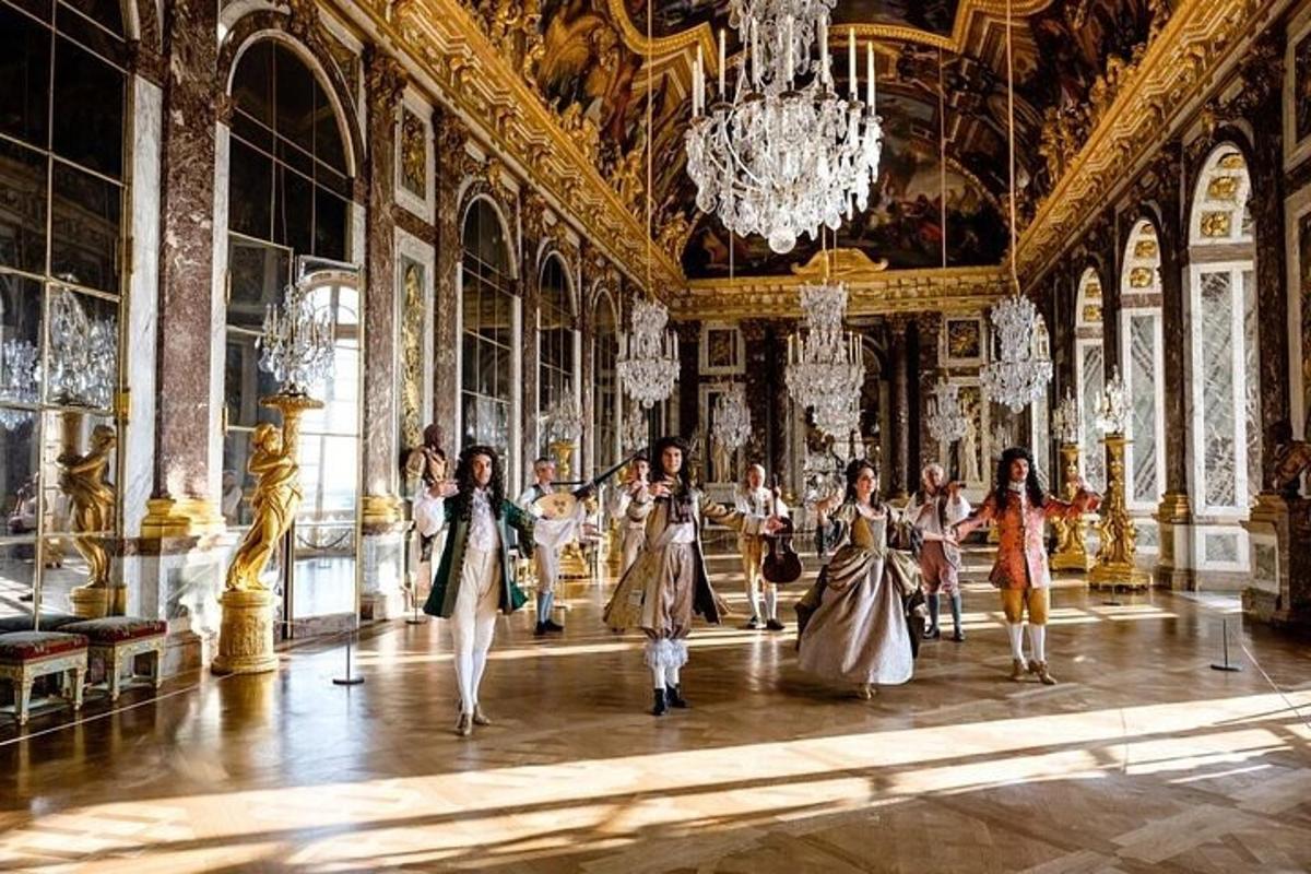 a group of people walking around a room in a palace