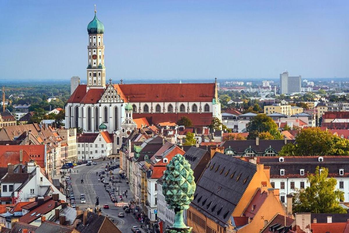 a city with a large building and a clock tower