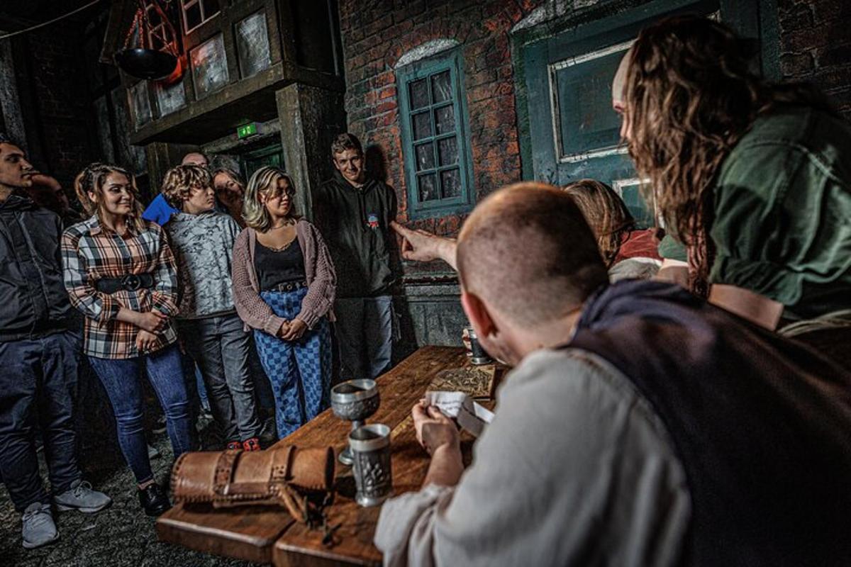 a group of people standing around a table in a room