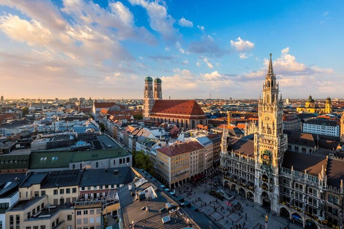 an aerial view of a city with a clock tower