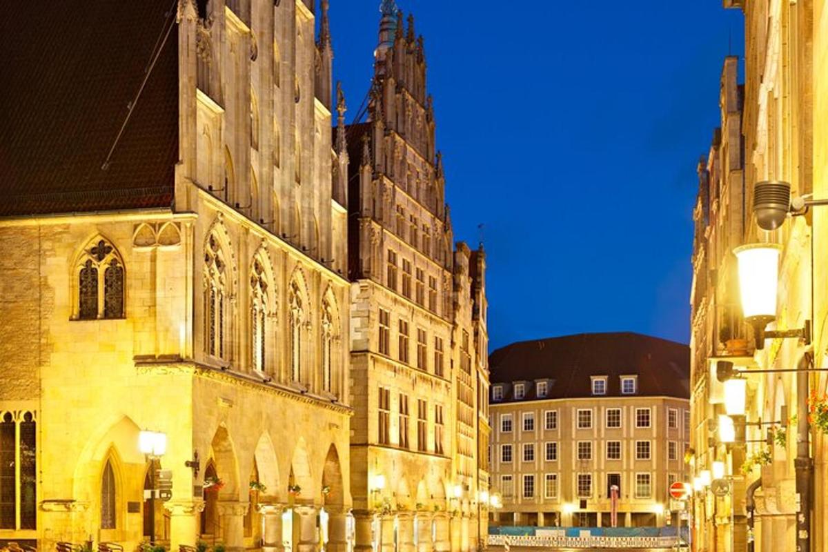 an old building with a clock tower on a city street