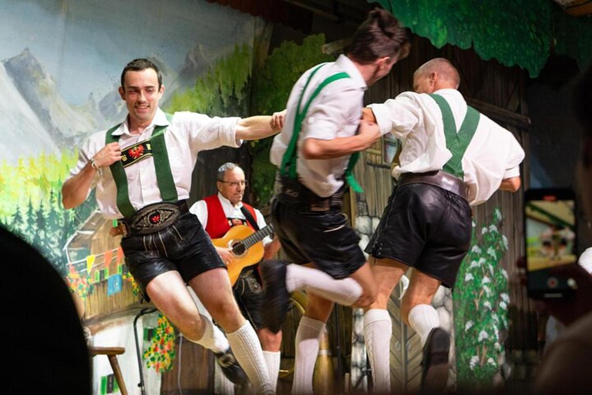 a painting of three men running on a stage