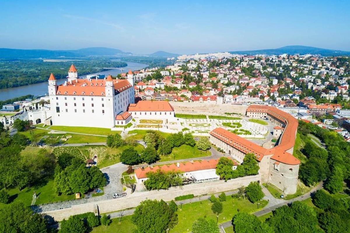 an aerial view of a castle and a city