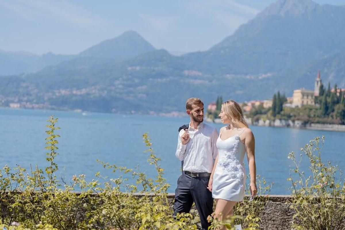 a man and a woman standing next to a body of water