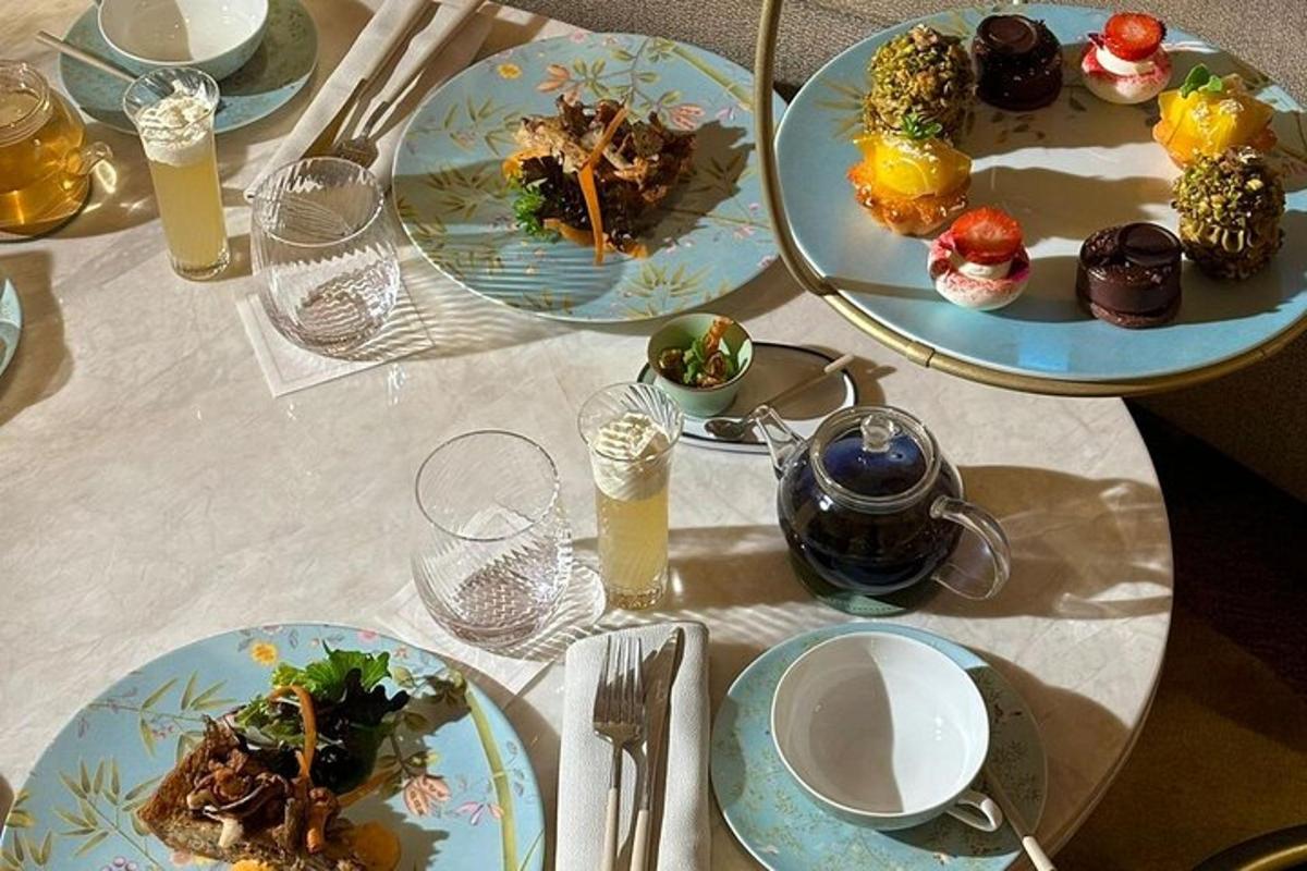 a table with plates of food on top of it