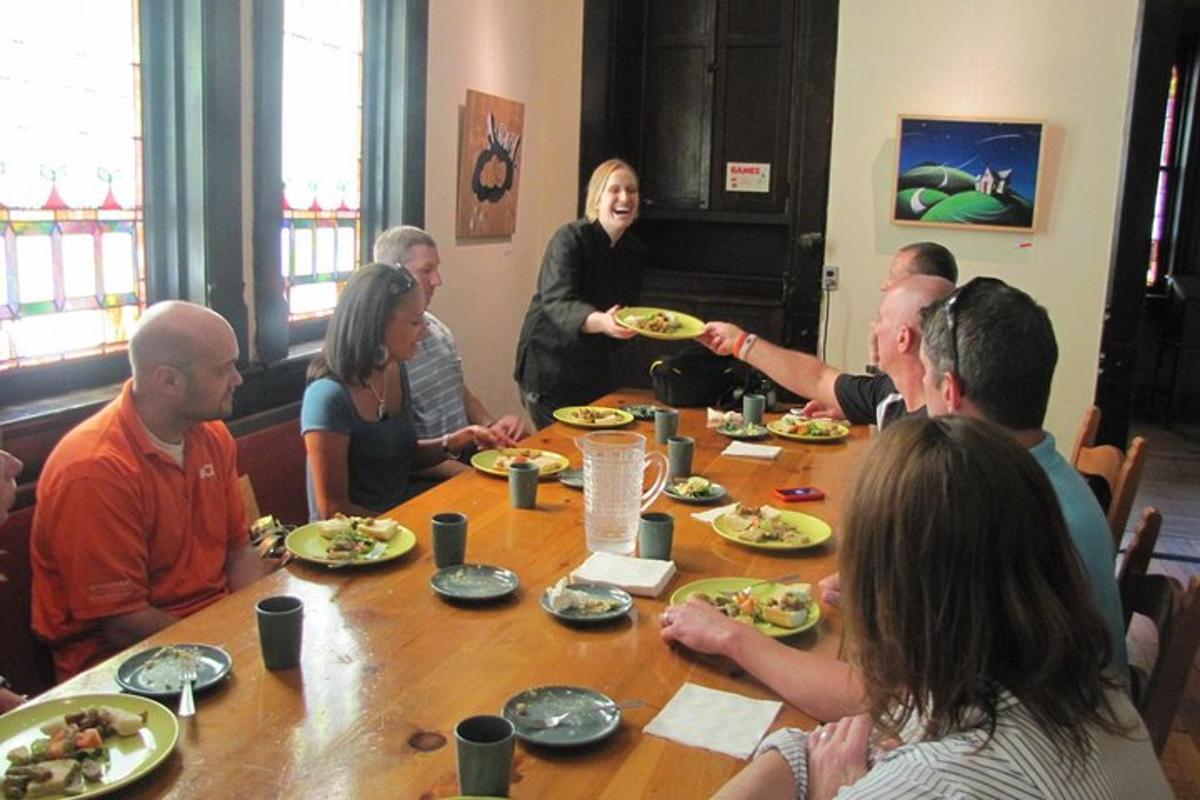a group of people sitting around a table eating