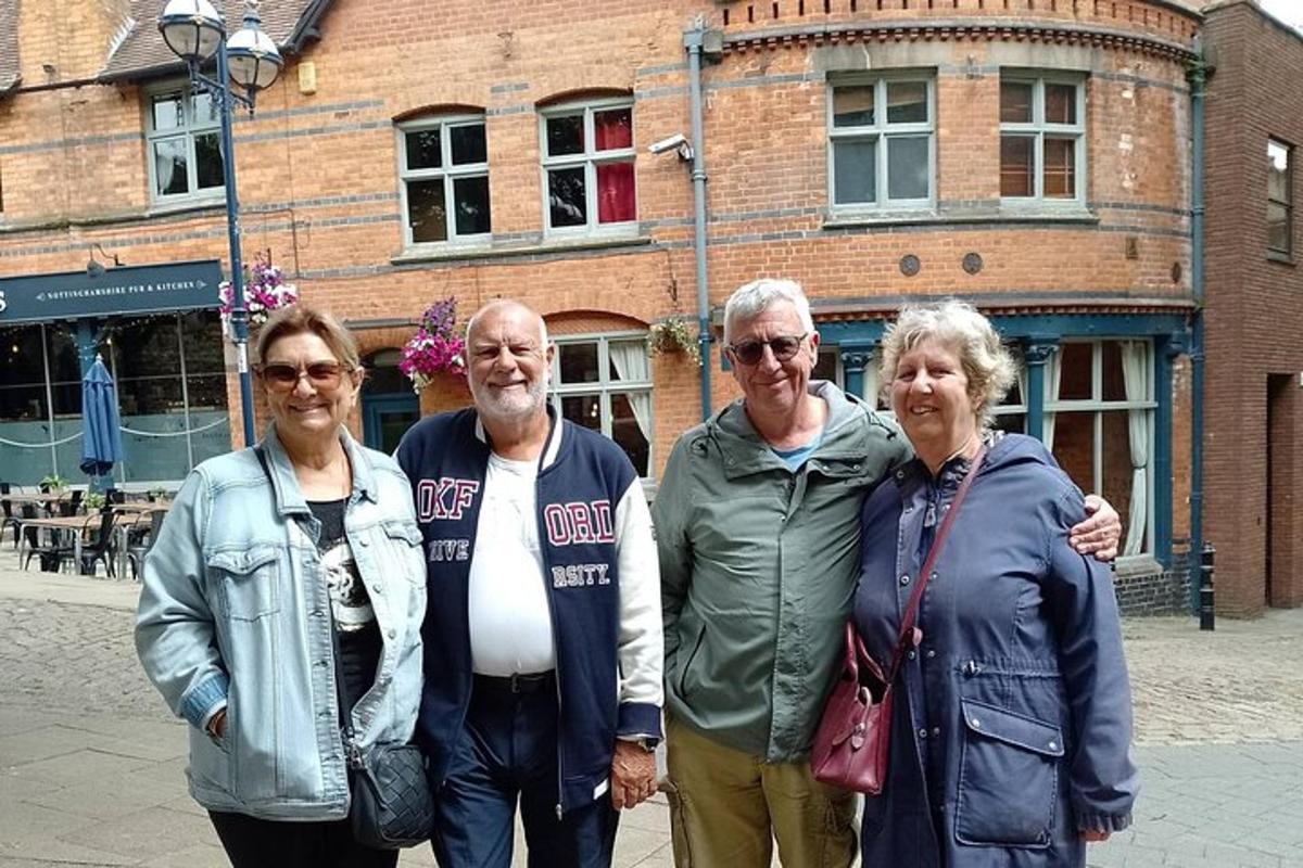 a group of people standing in front of a building