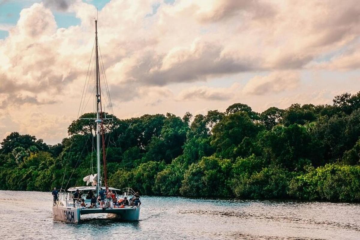a boat with people on it in the water