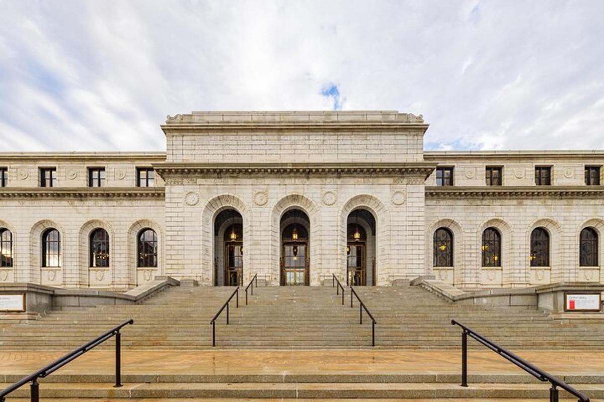 a large building with stairs in front of it