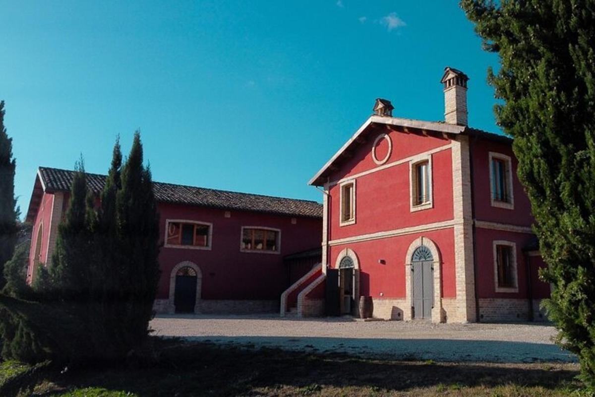 a red building with a chimney on top of it