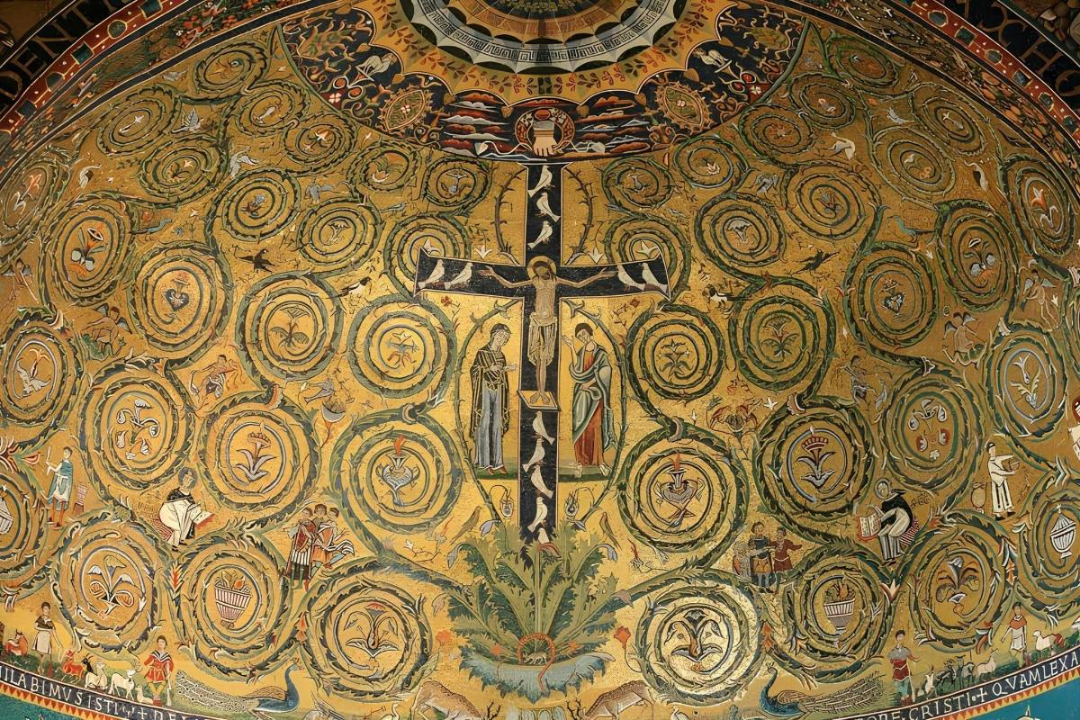 a cross on the wall of a church