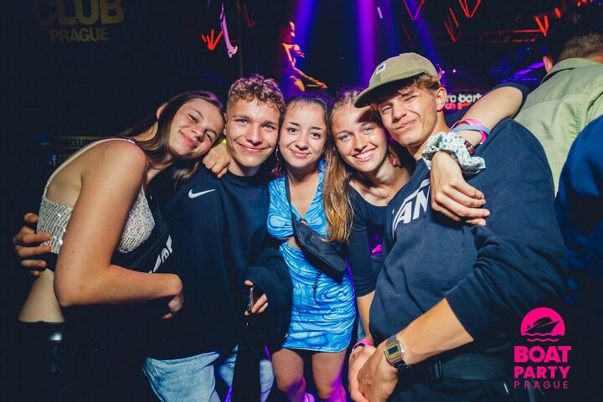 a group of people posing for a picture at a party