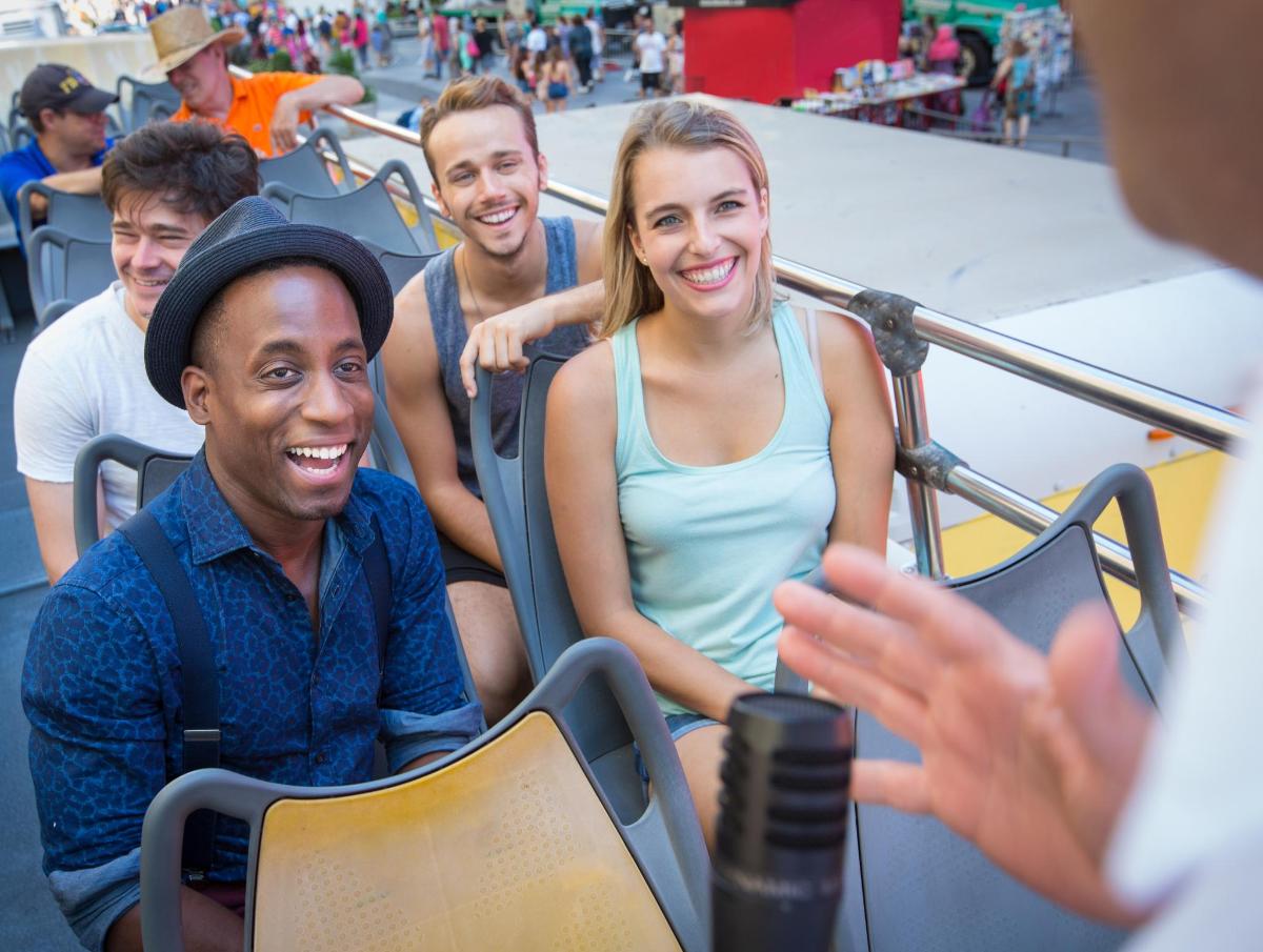 a group of people sitting on a roller coaster