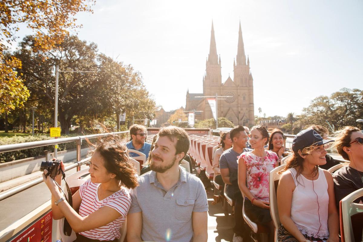 a group of people standing on a bus