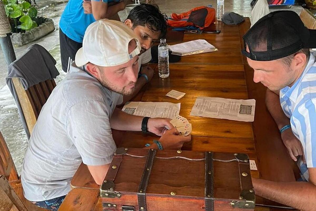 a group of men sitting at a wooden table