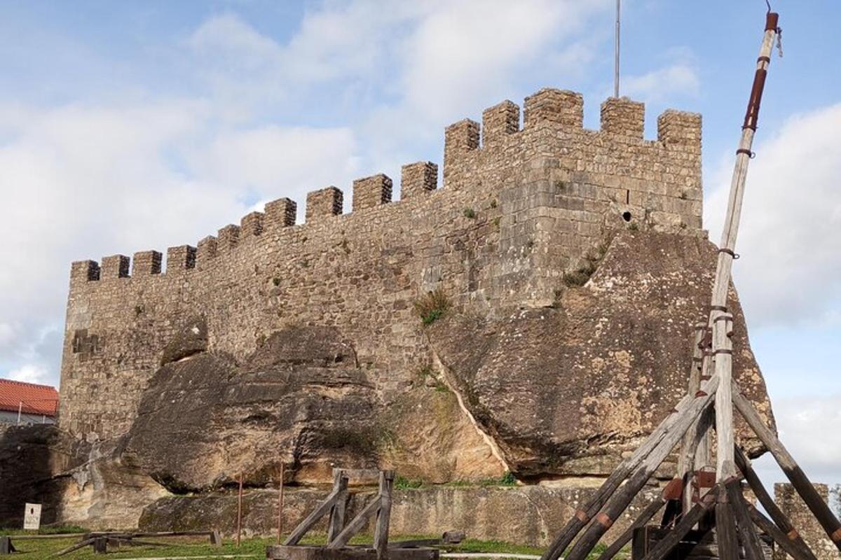 a large castle on top of a rock