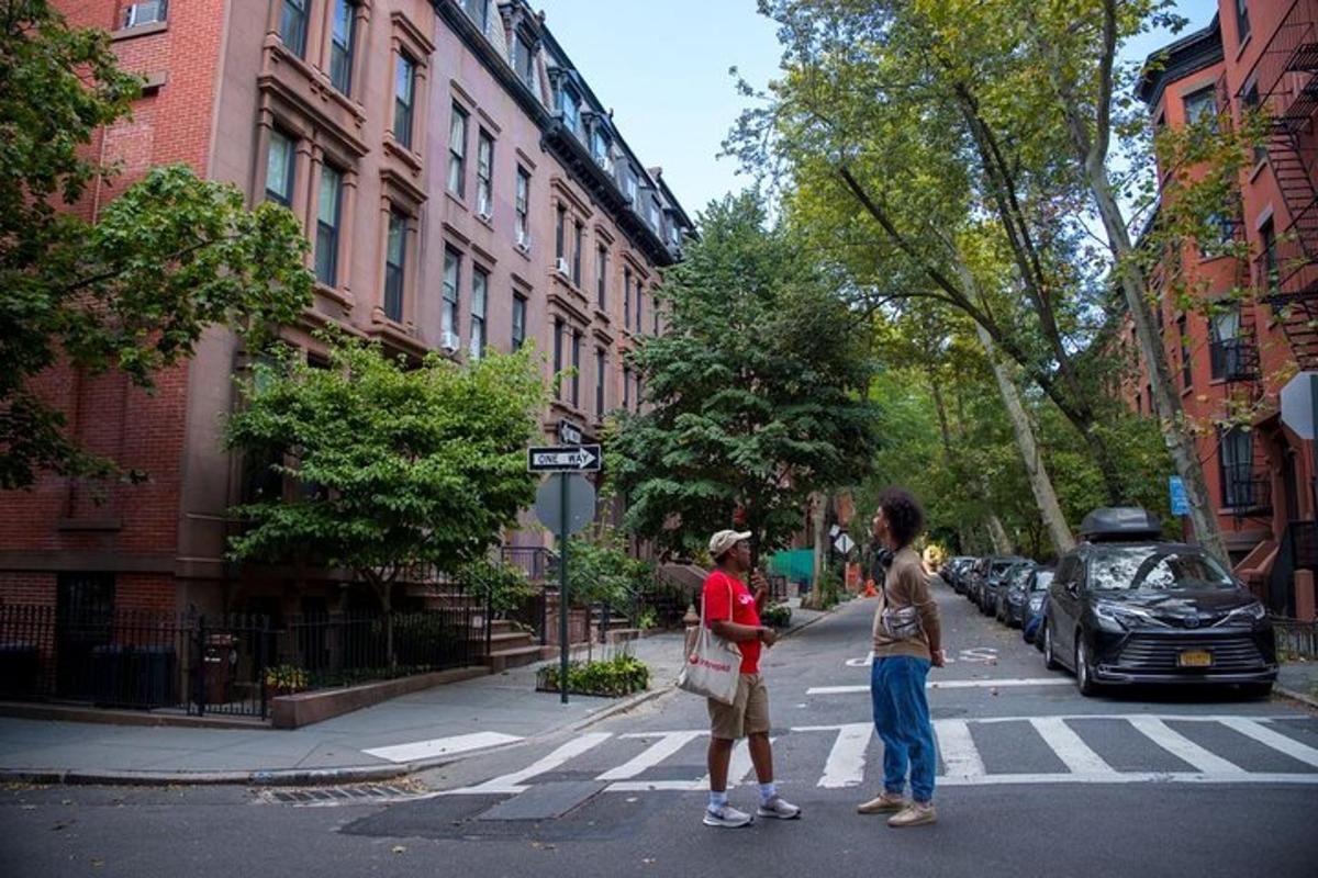 two girls crossing the street at a crosswalk