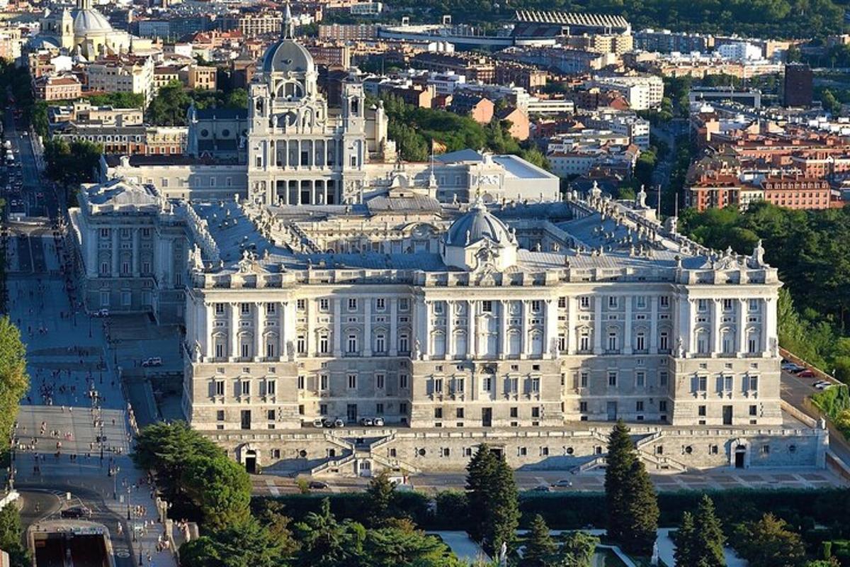 an aerial view of a large white building