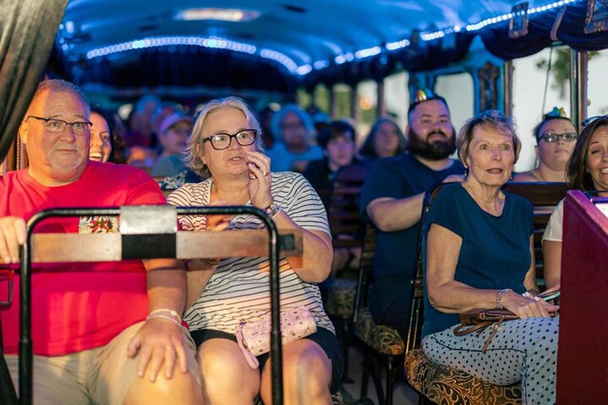a group of people sitting on a bus