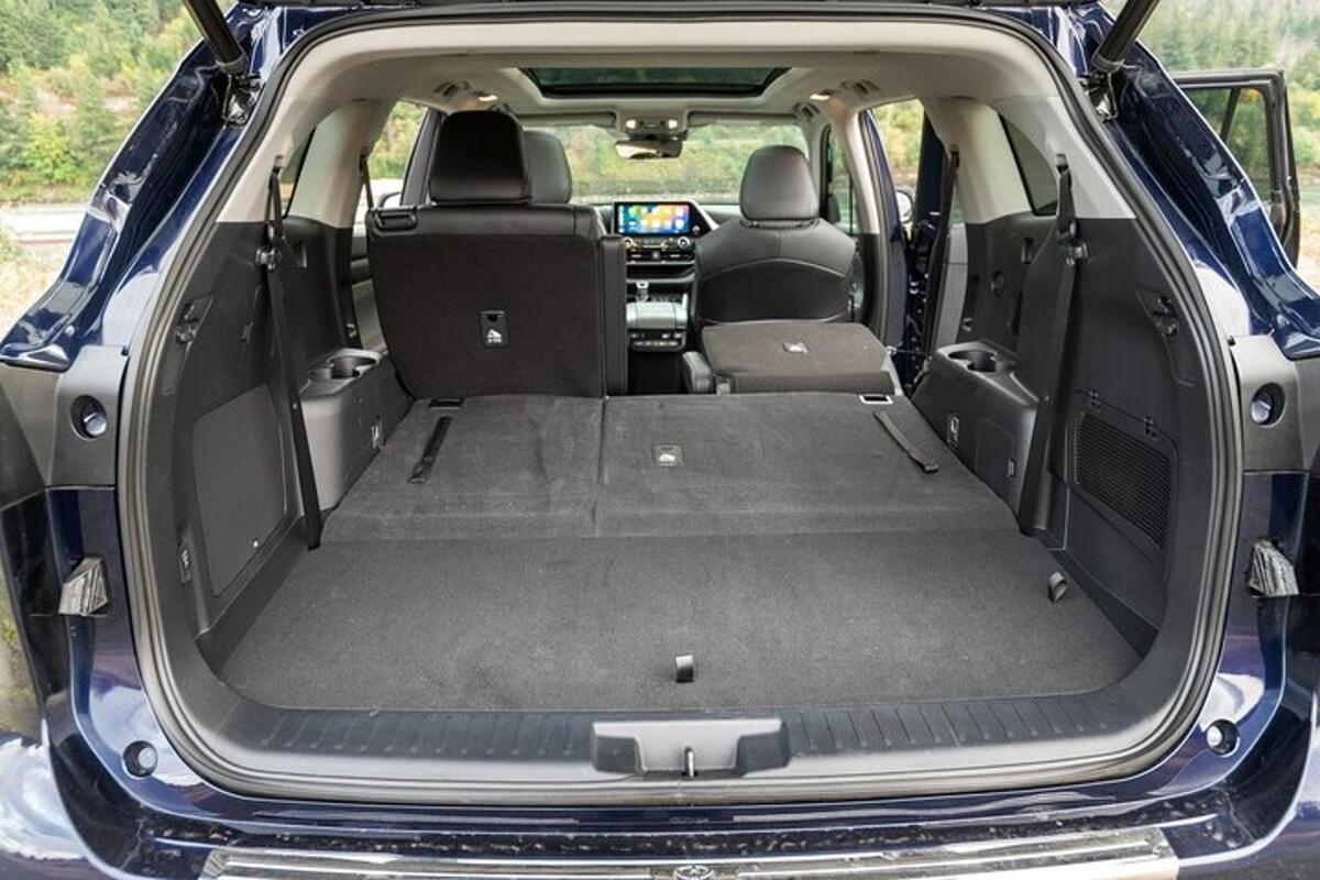 an open trunk of a car with the door open