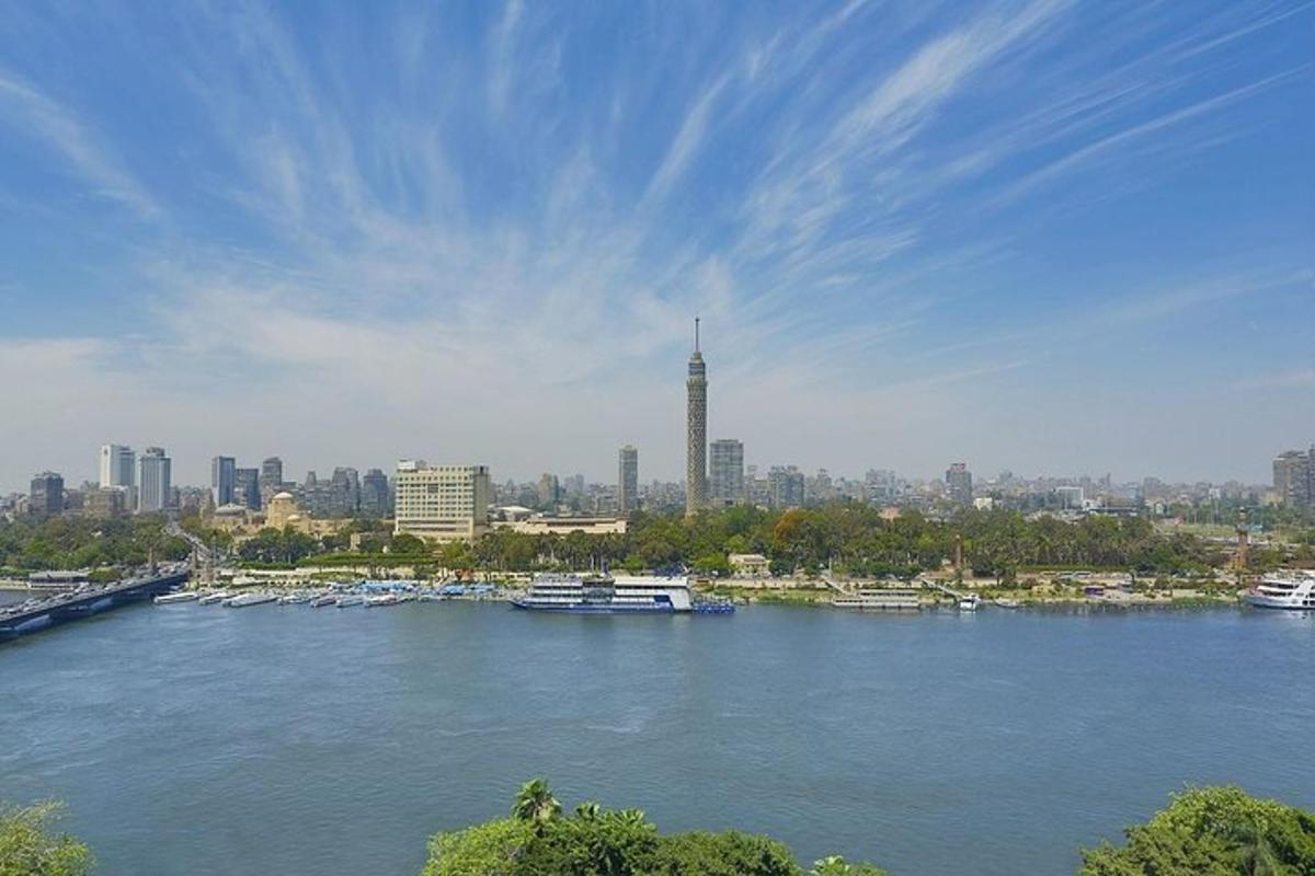 a view of a river with boats in a city