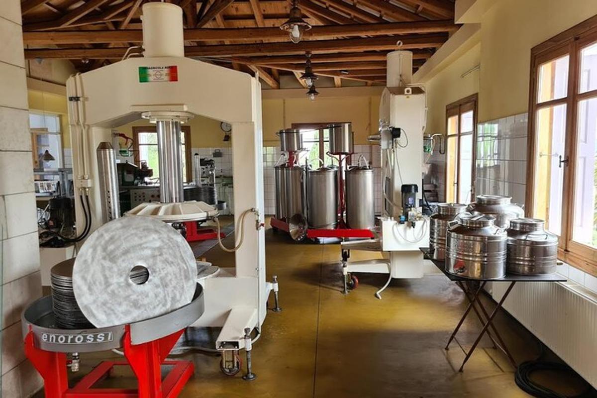 a large room with a machine and tanks in it