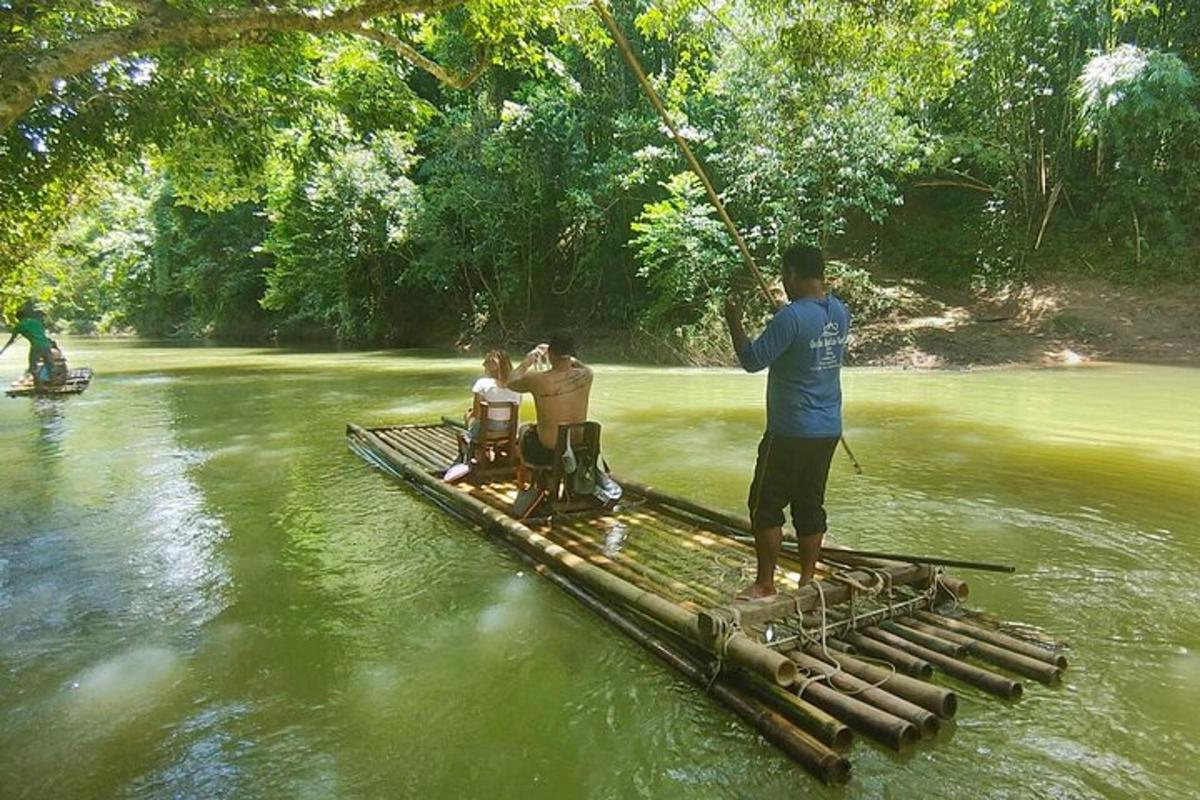 a group of people on a raft in the water