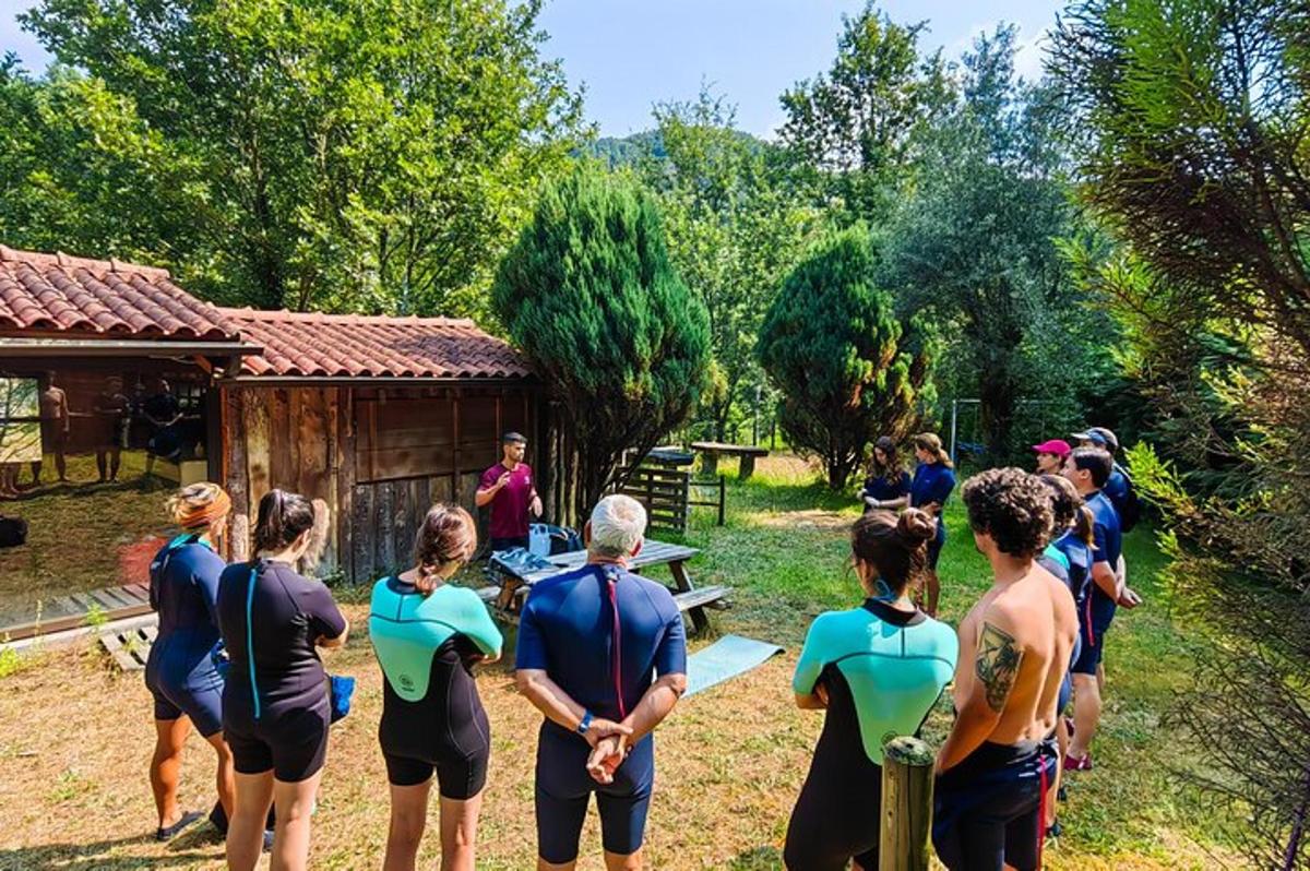 a group of people standing in front of a cabin