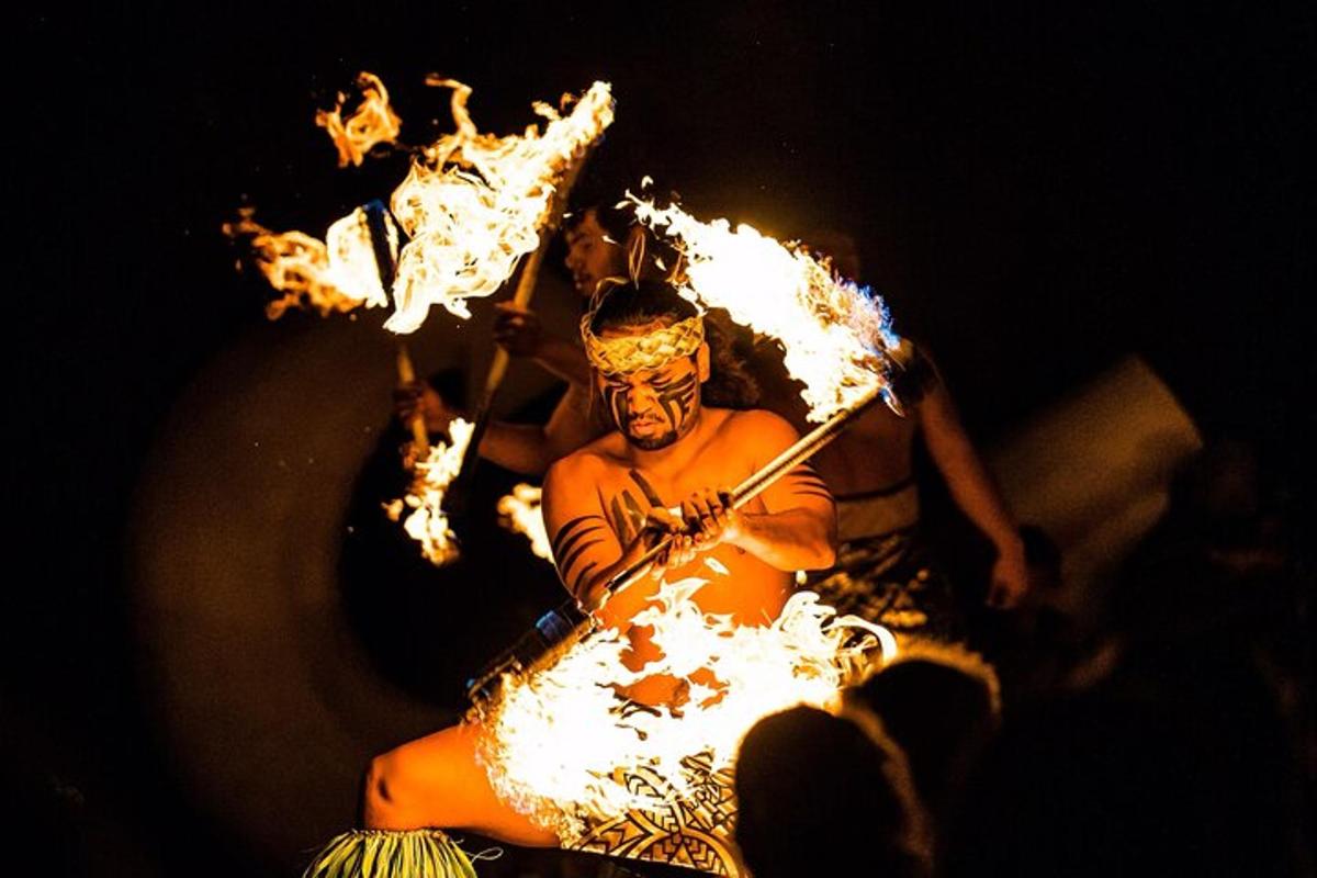 a man in a fire costume holding an umbrella