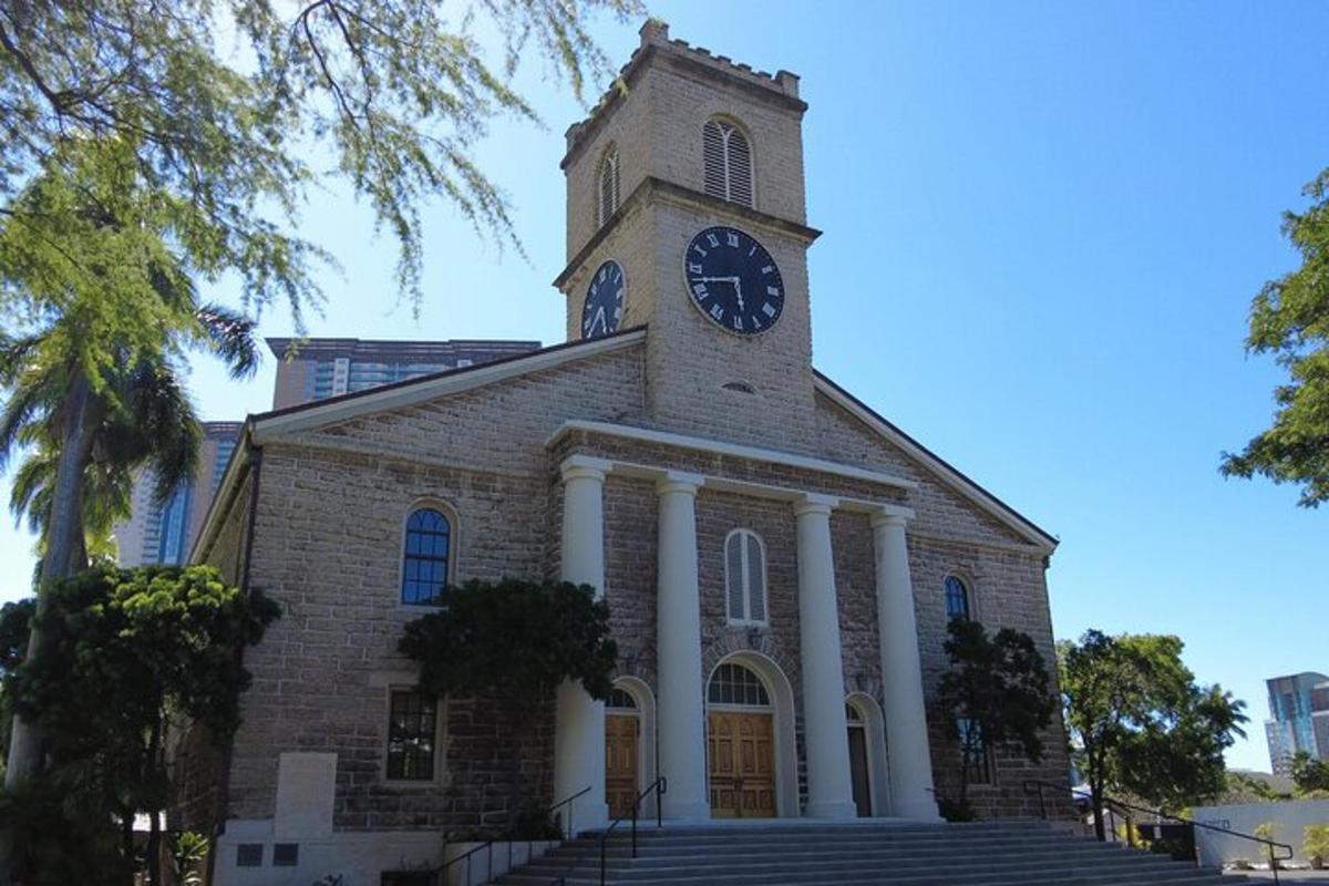 a church with a clock tower on top of it