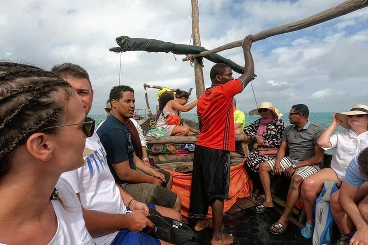 a group of people on a boat in the water