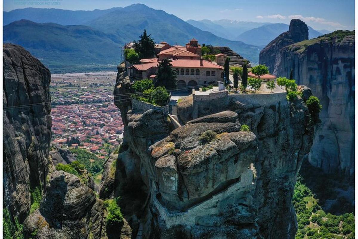 a house on the edge of a mountain