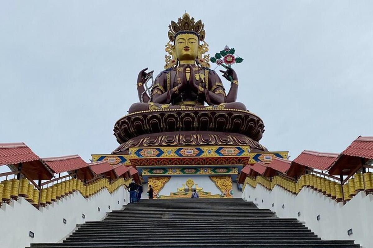 a large statue sitting on top of a building