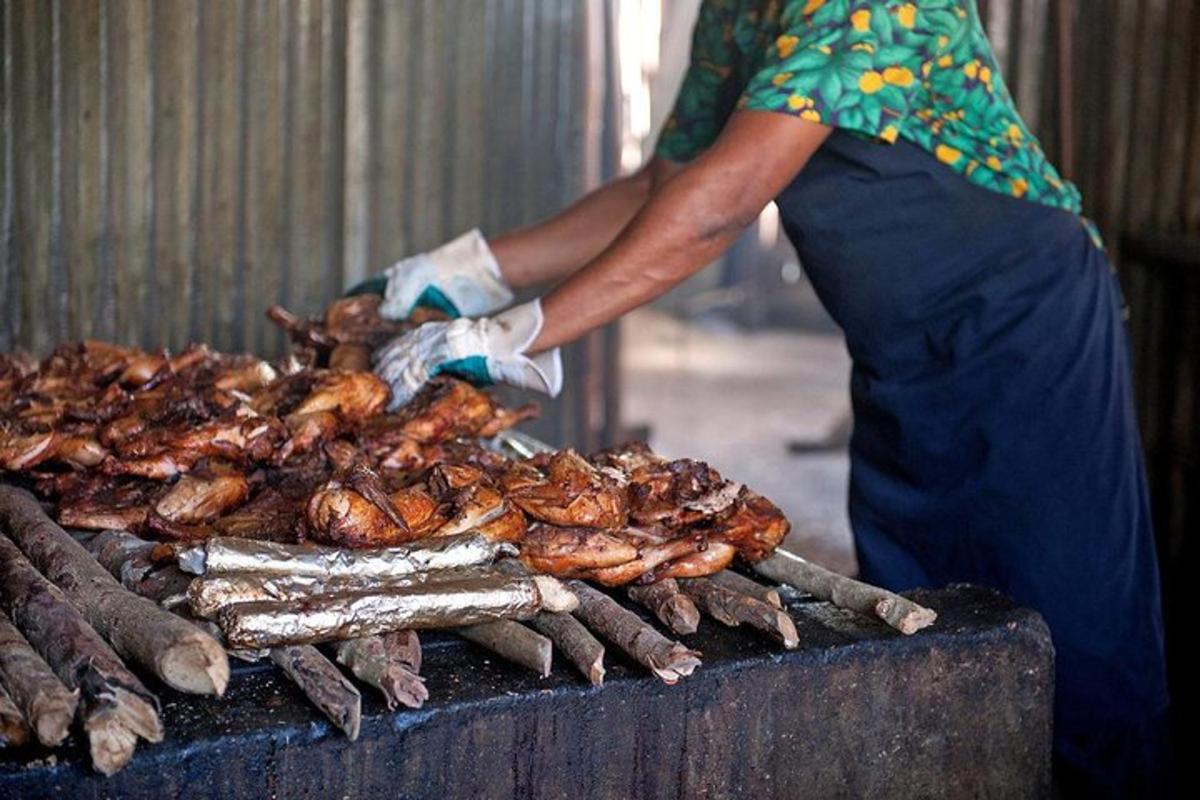 uma mulher está cozinhando comida na grelha