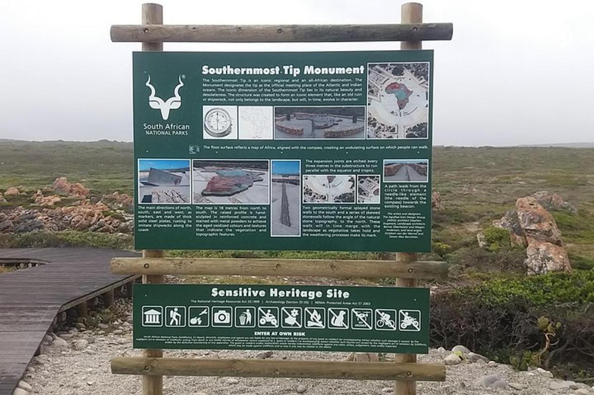 a sign for a interpretive sign at the top of a mountain