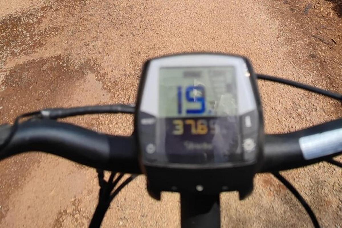 a close up of a digital meter on a bike