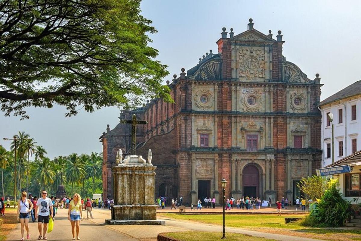 a large building with people walking in front of it