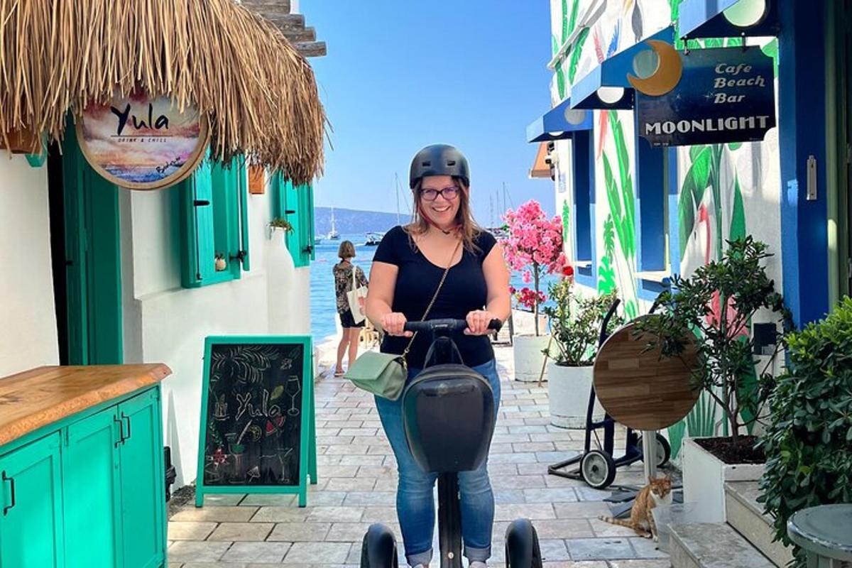 a woman riding a scooter down a street