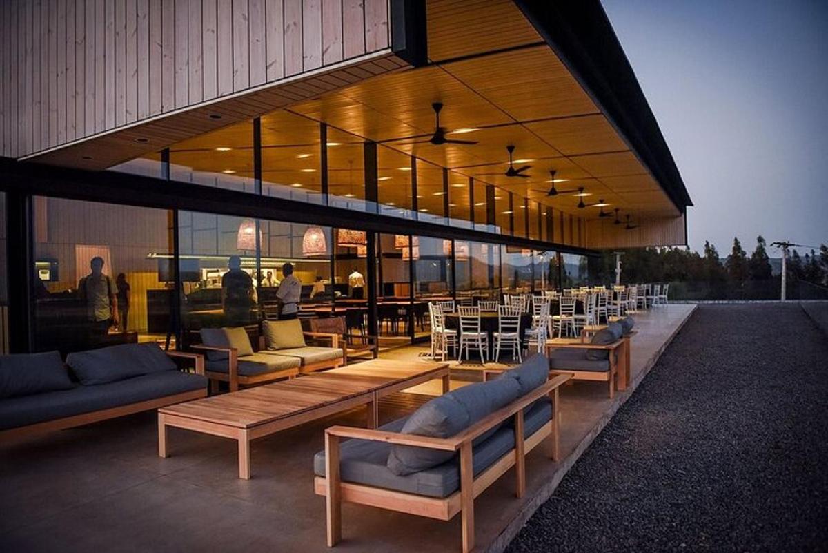 a building with couches and tables and chairs