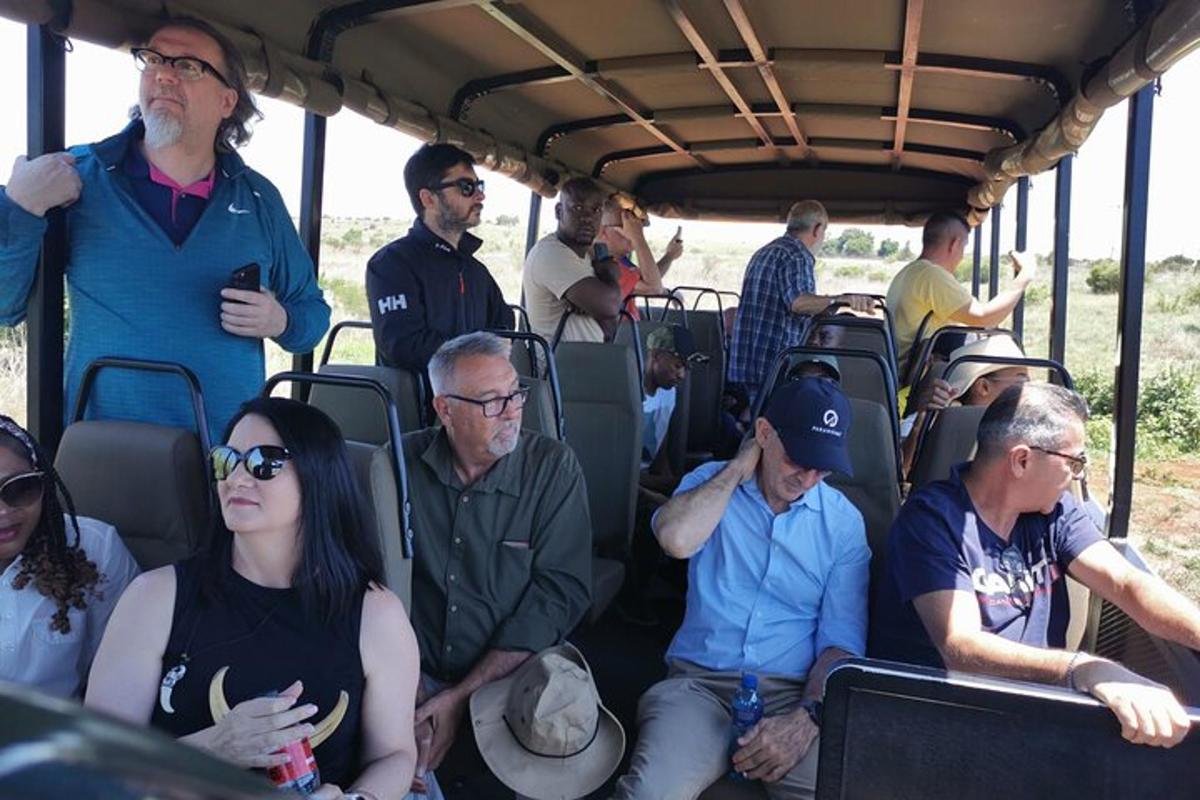 a group of people sitting inside of a bus
