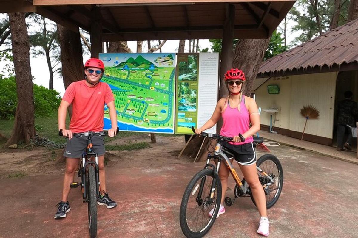 a man and a woman on their bikes