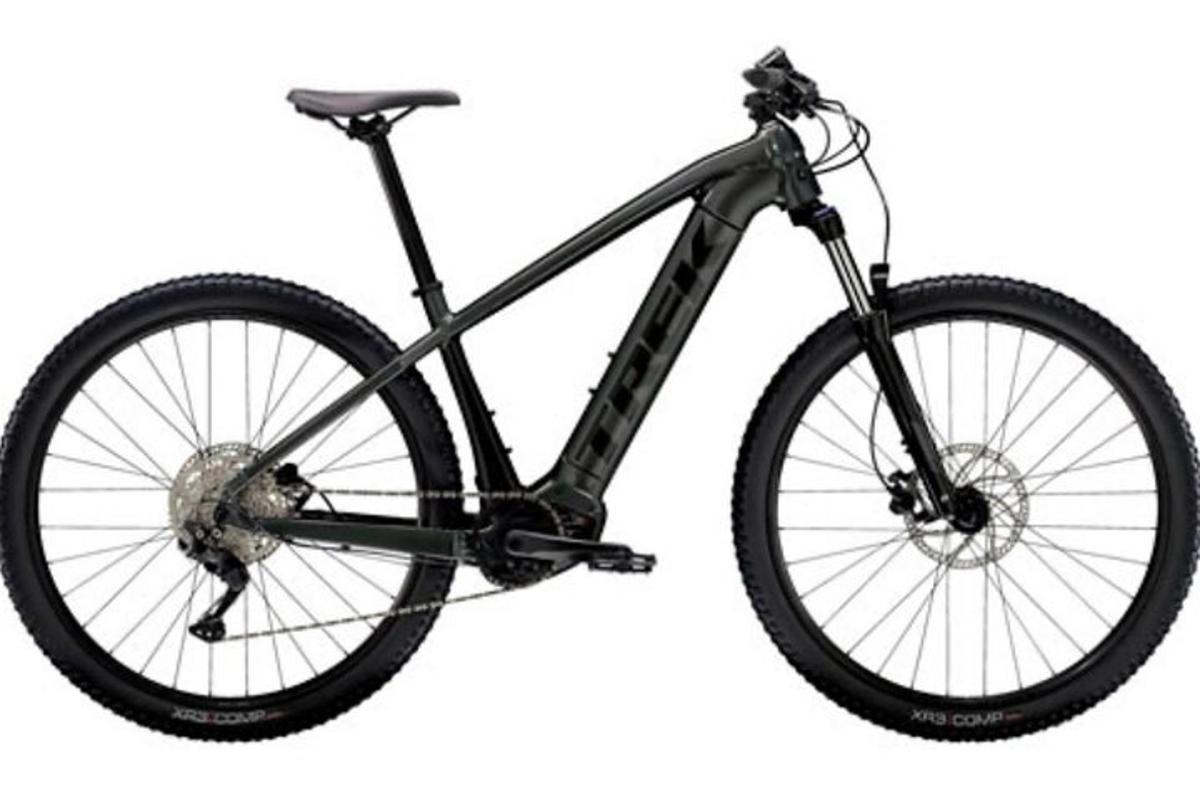 a black bike is flying in the air